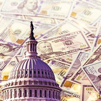 Capitol dome with background of dollar bills.