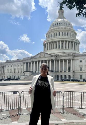 Deida Cortez standing in front of the Capitol.