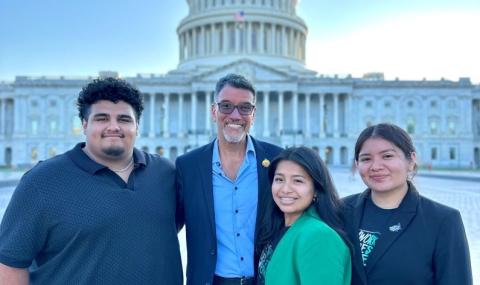 Cleo and the 2024 interns standing in front of the US Capitol.